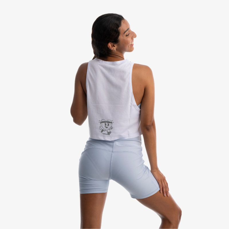 Tank mujer de algodón color blanco, vista posterior, diseño sin mangas minimalista.