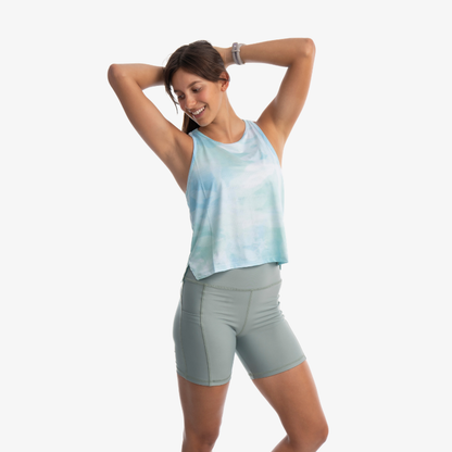 Tank deportivo mujer agua marina o celeste degradado, fit relajado ideal para entrenamiento.