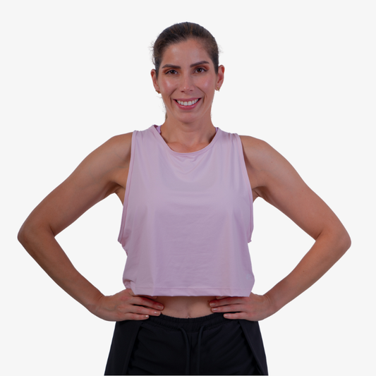 Tank deportivo mujer color rosado claro, fit relajado ideal para entrenamiento.